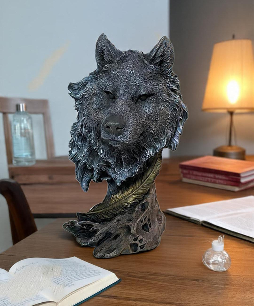 A fox face sculpture adorned with a feather