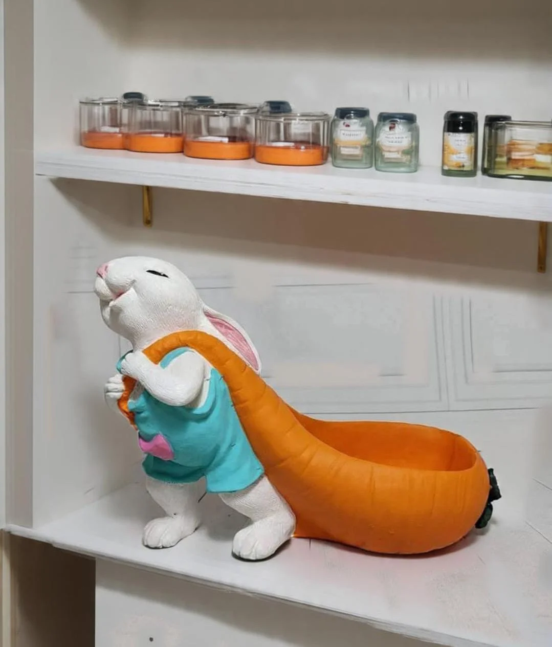 Rabbit holding orange basket - Image 4