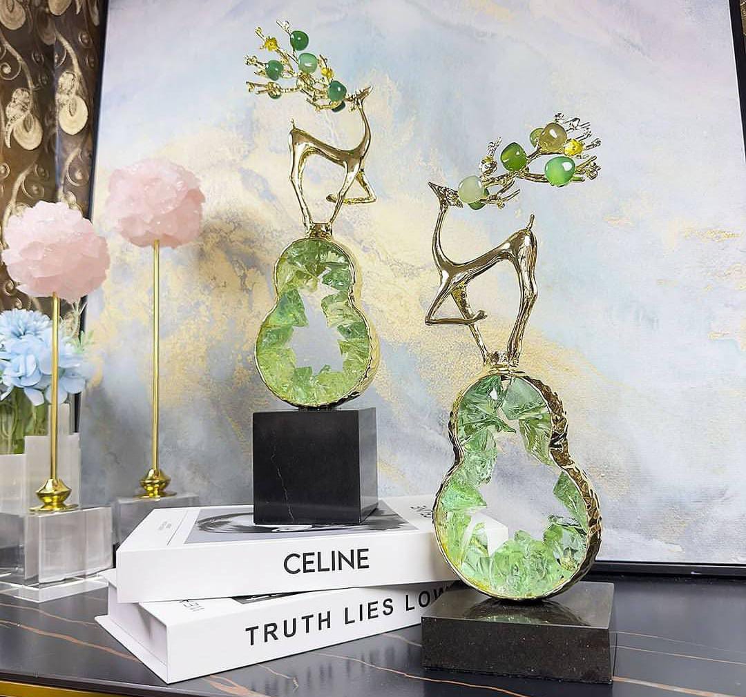 Set of 2 standing deer on a marble base with green stone