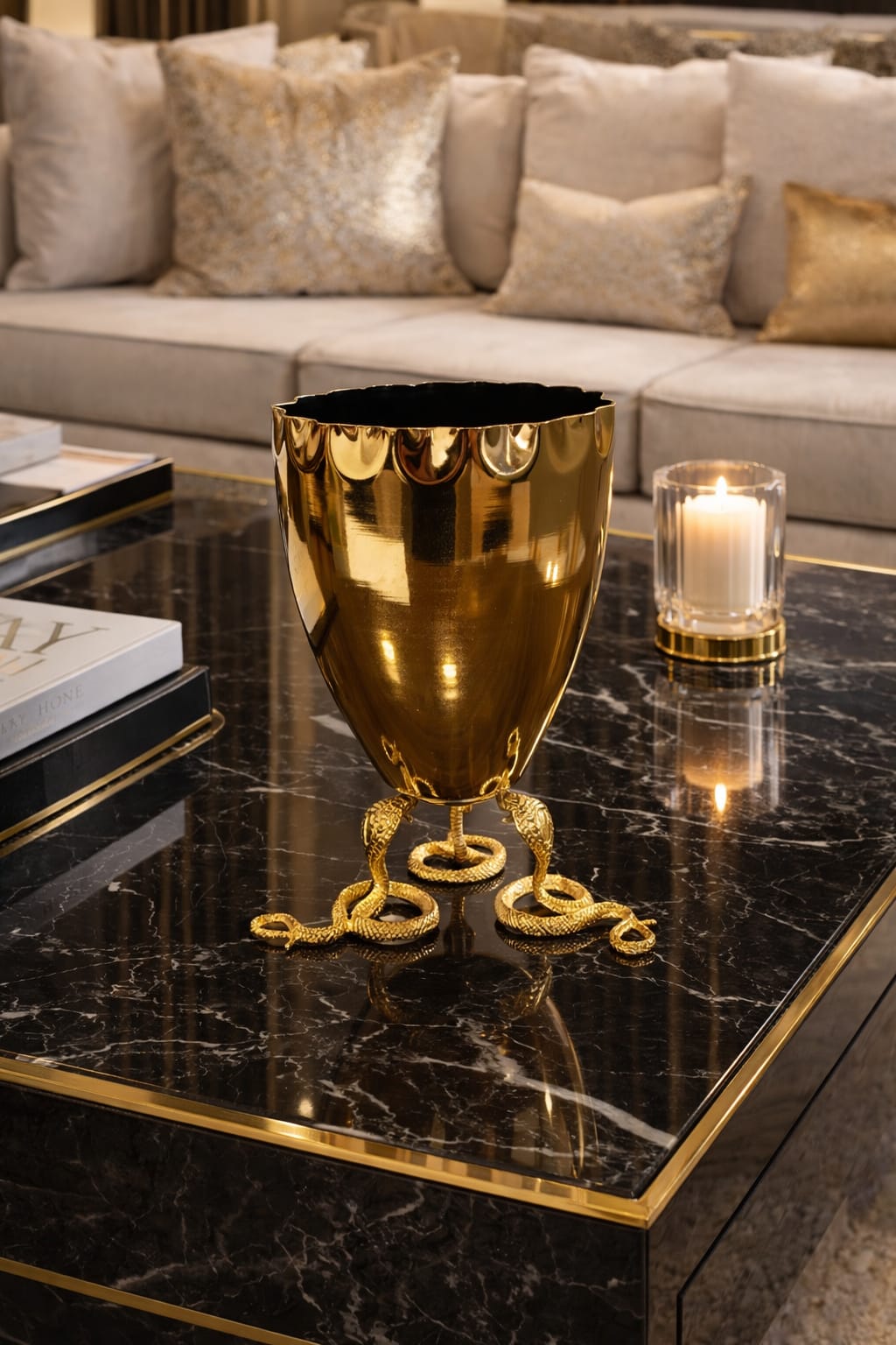 Gold vase with snake base