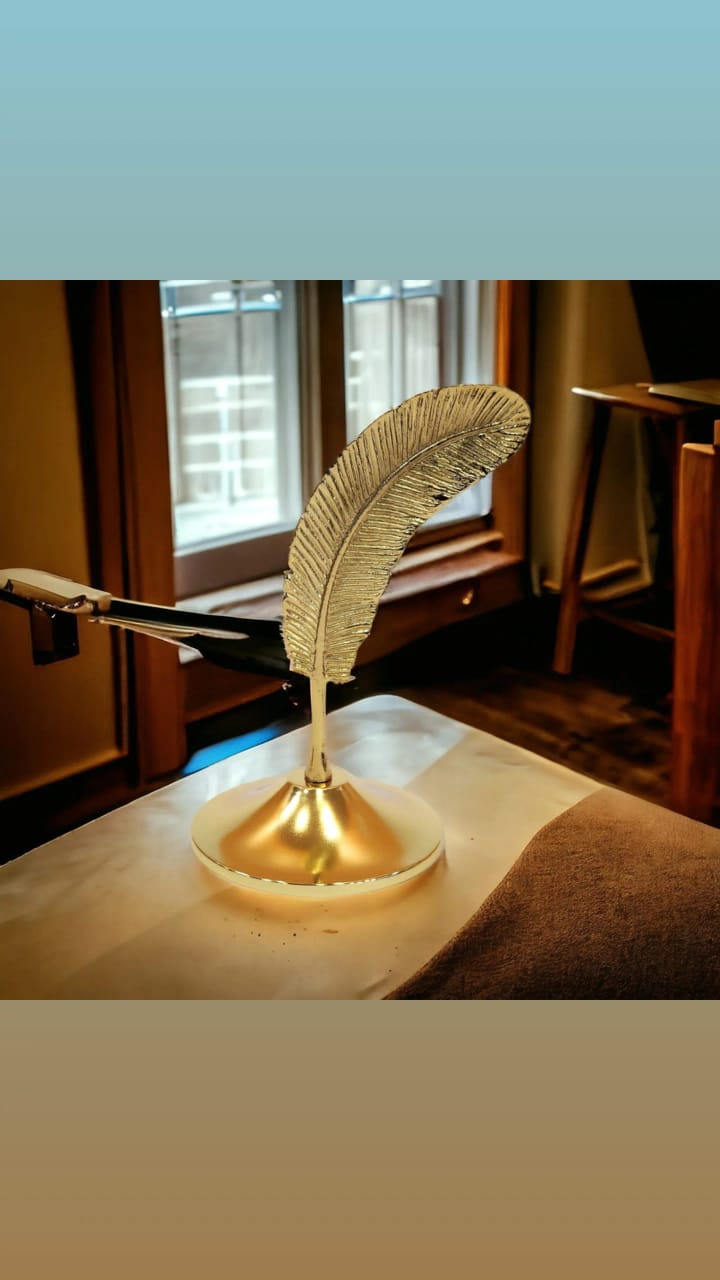 Decorative gold feather sculpture