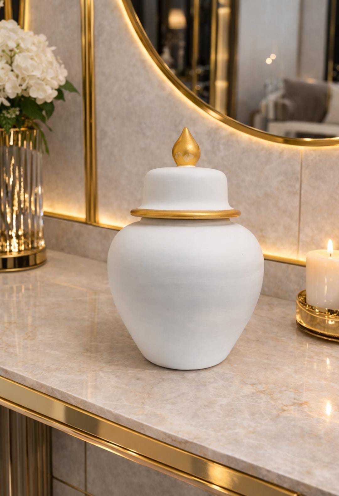 Decorative ceramic ginger jar with a removable lid and gold accents