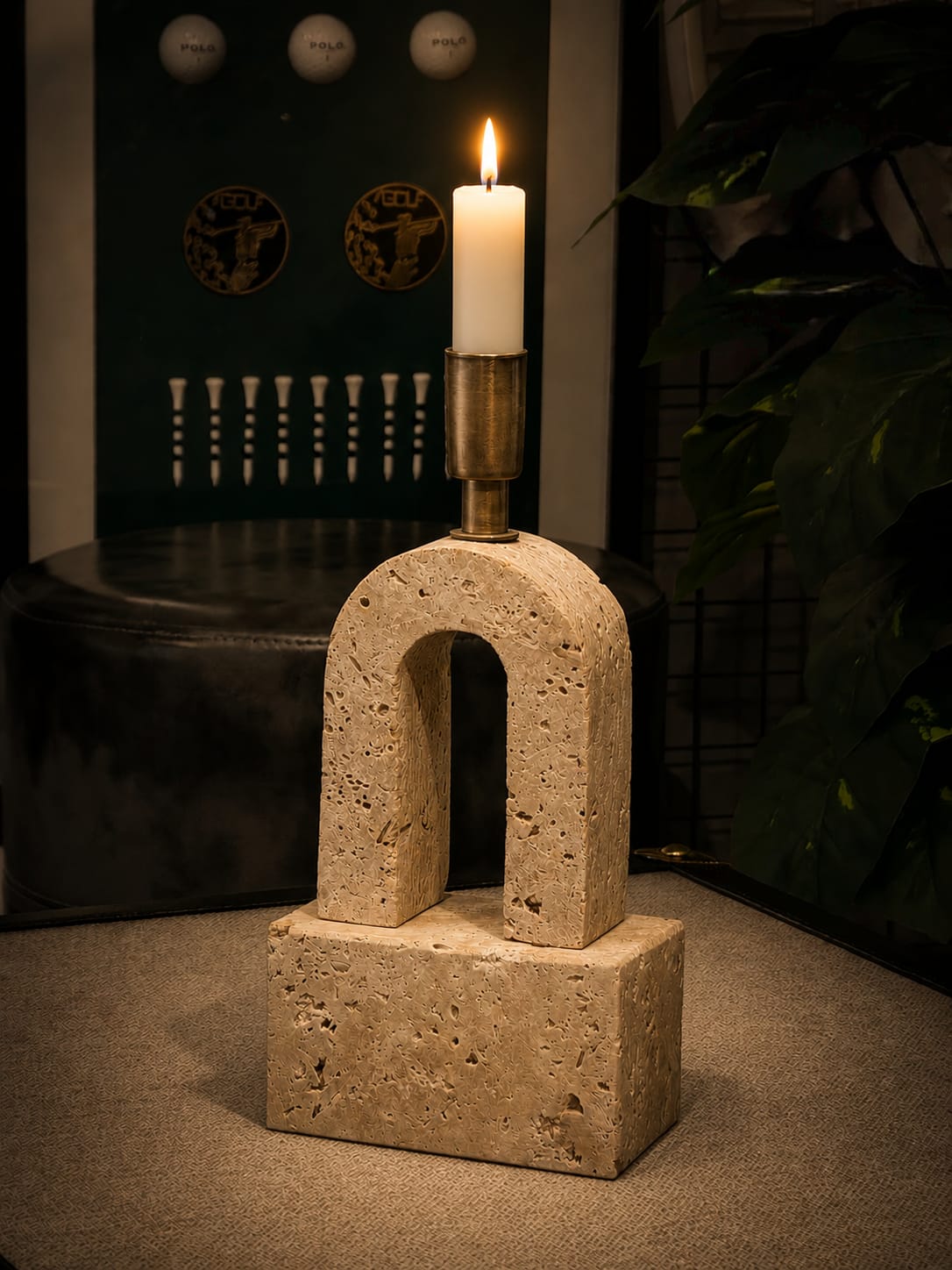 travertine candle holder featuring a u-shaped design
