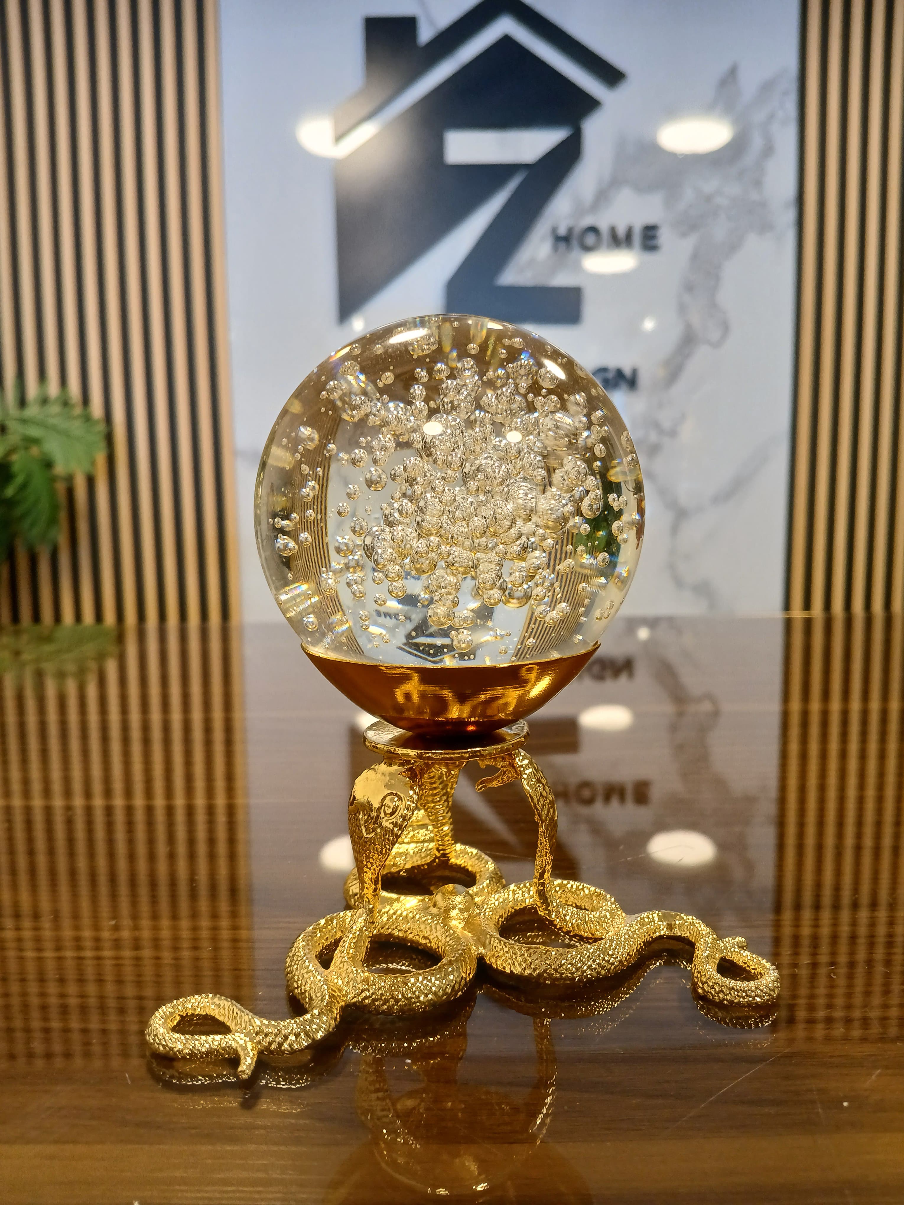 Glass ball with snakes