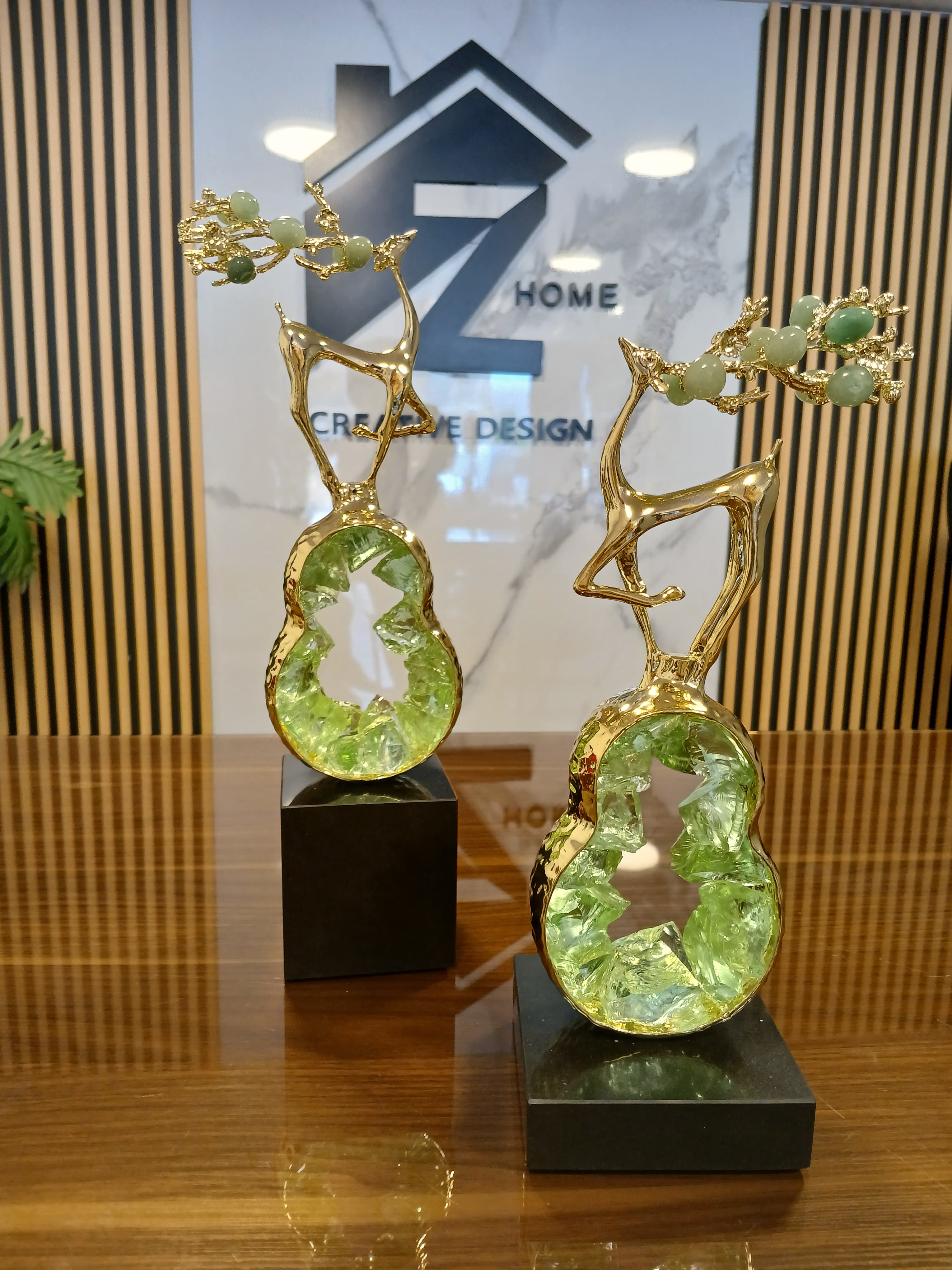 Set of 2 green deer ornaments