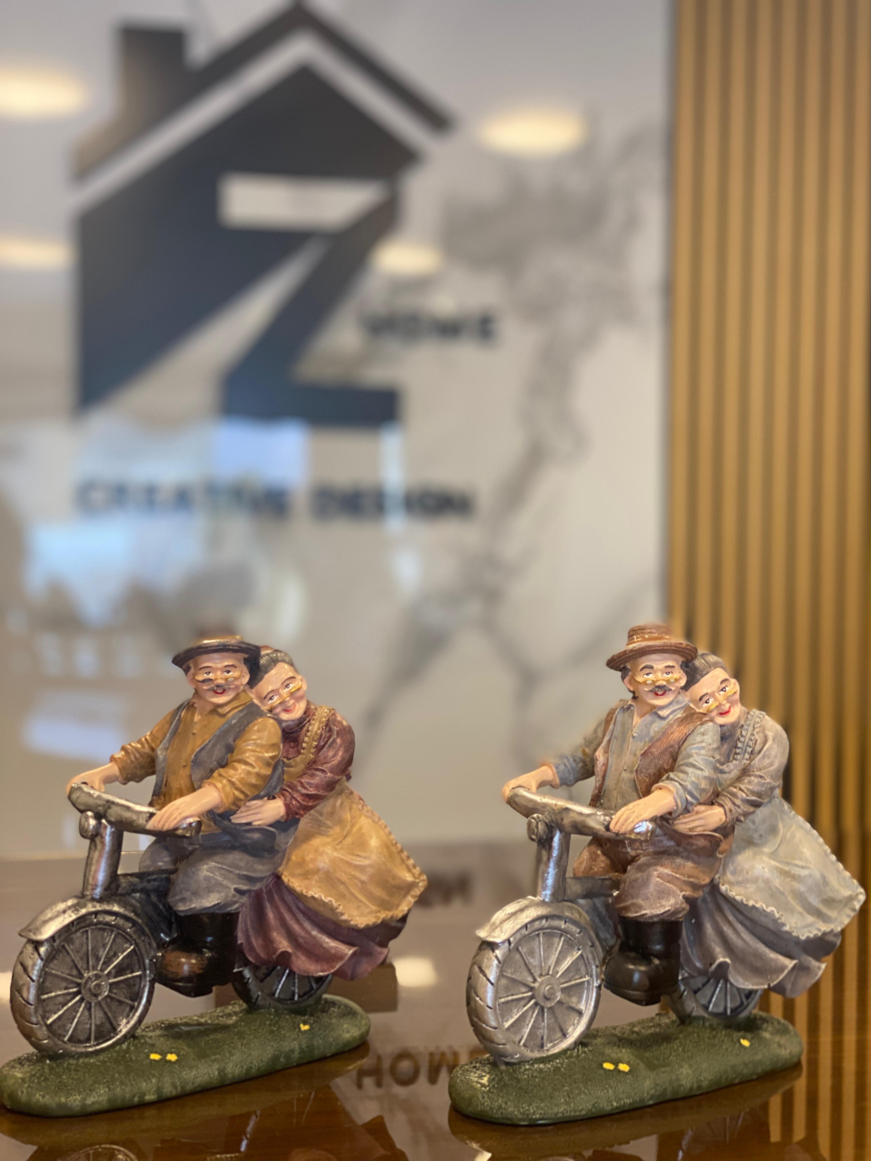 Elderly Couple Riding Bicycle Decorative Statues