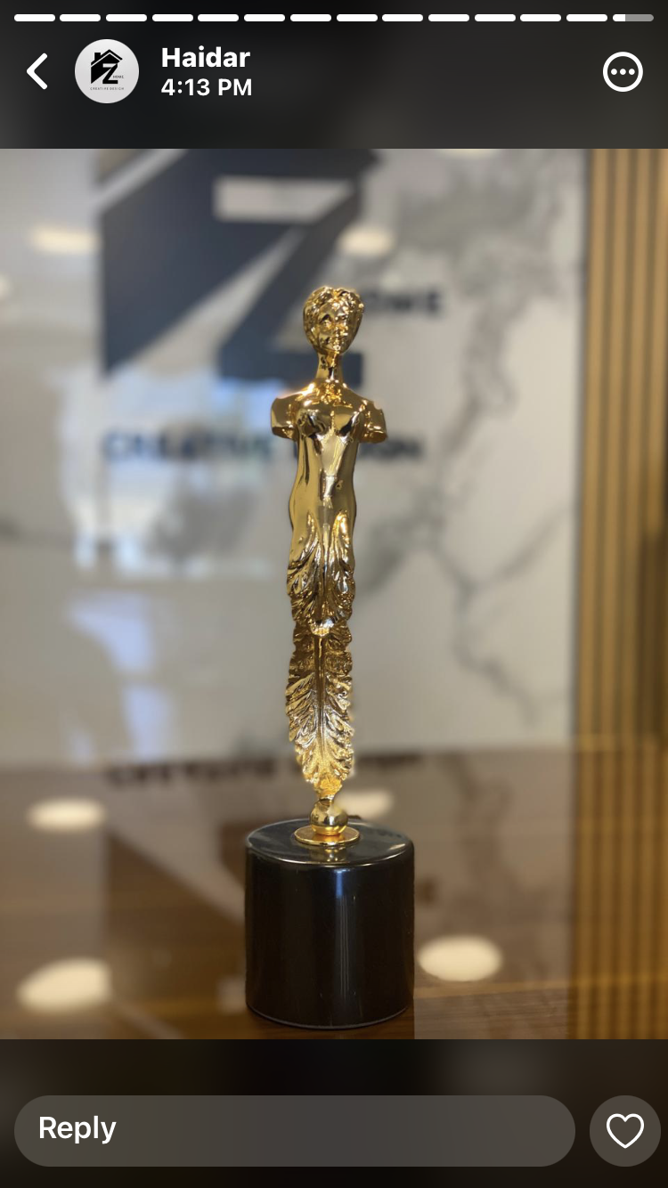 Golden Lady Figurine Trophy on a Black Base